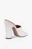 Mules in white leather sold by Paris Texas