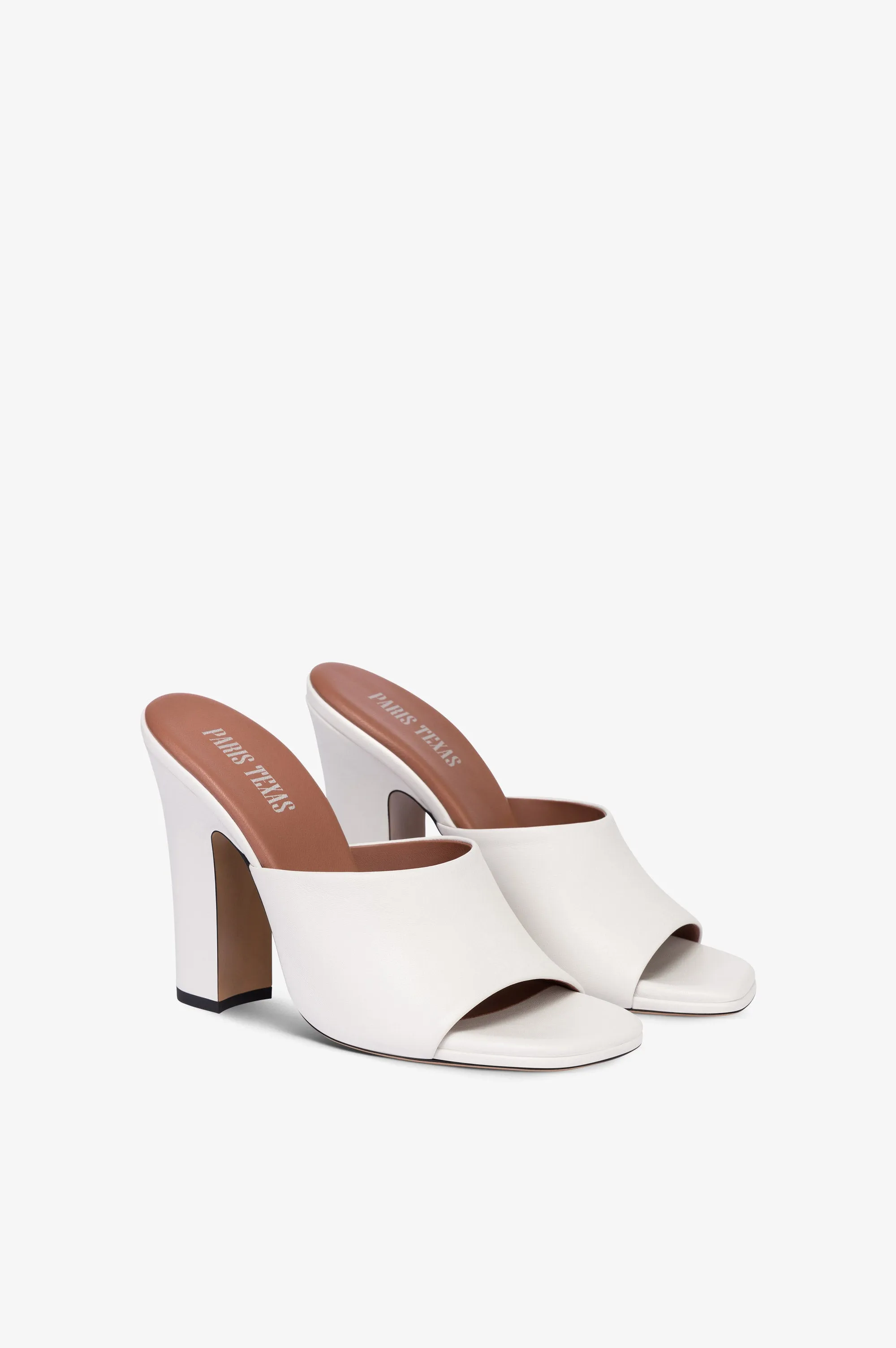 Mules in white leather sold by Paris Texas product image thumbnail 2