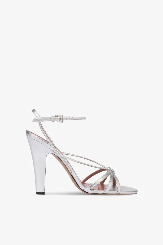 Sandals in white leather sold by Paris Texas