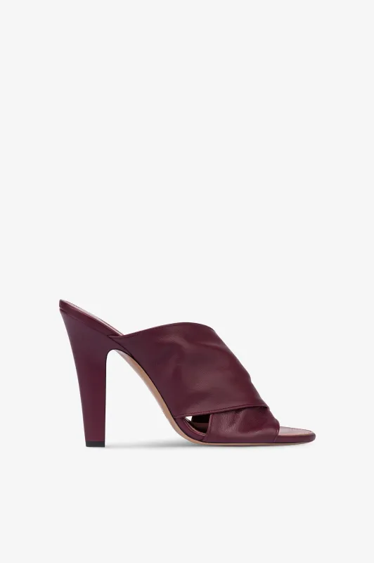 Mules in rouge noir leather sold by Paris Texas