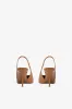 Slingbacks in tan leather sold by Paris Texas