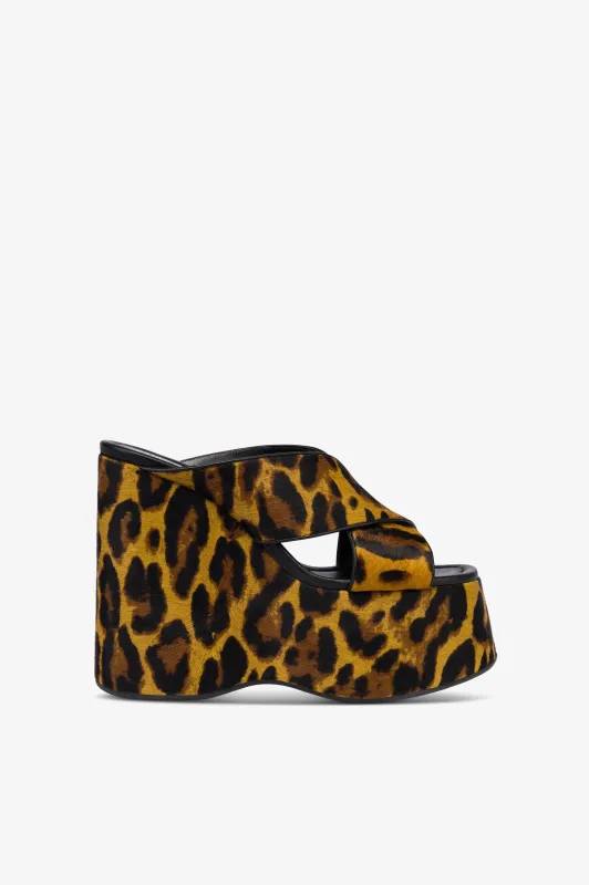 Mules in mustard leopard-print cowhide sold by Paris Texas