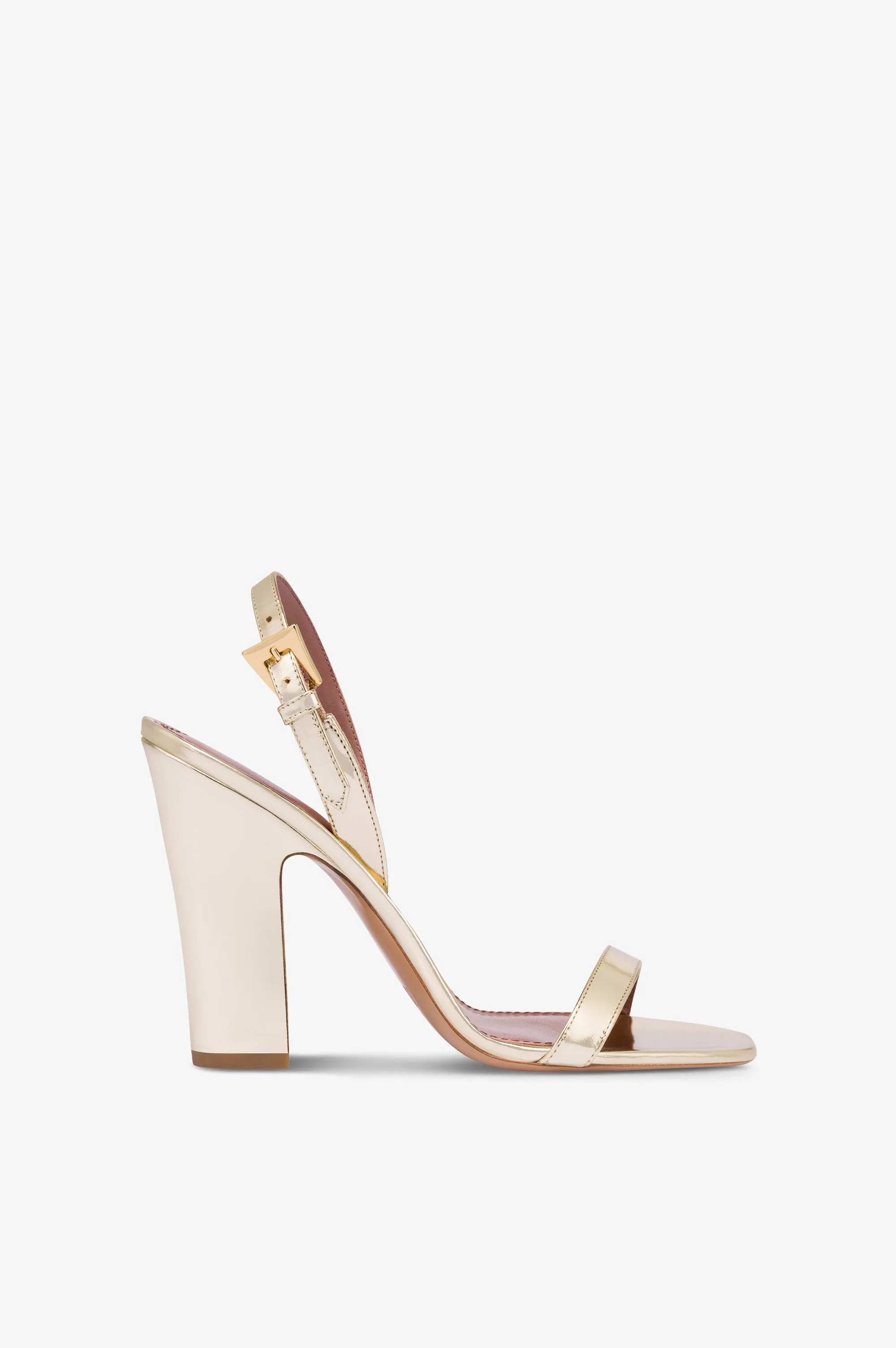 Slingbacks in gold mirror-effect leather sold by Paris Texas