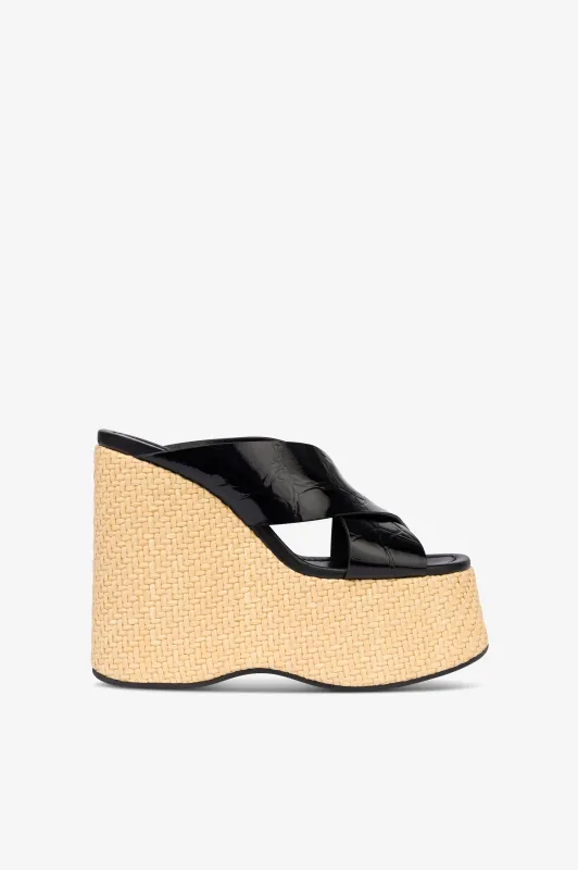 Mules in black patent leather made by Paris Texas