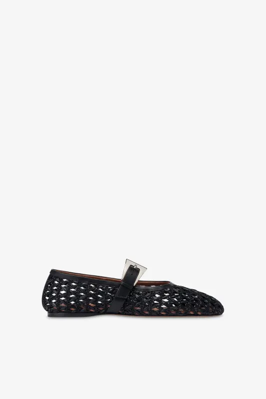 Ballet flats in black raffia and leather sold by Paris Texas