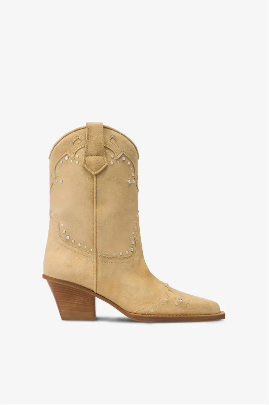 Boots in suede leather with silver studs sold by Paris Texas