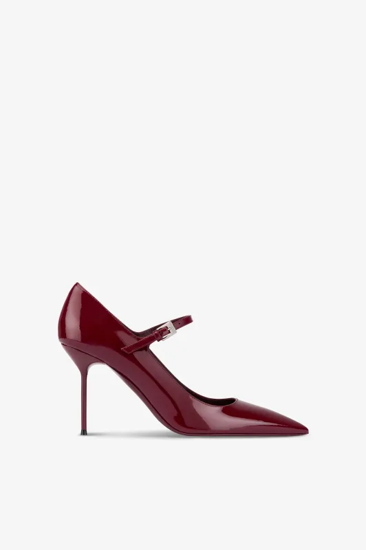Pumps in rouge noir patent leather sold by Paris Texas