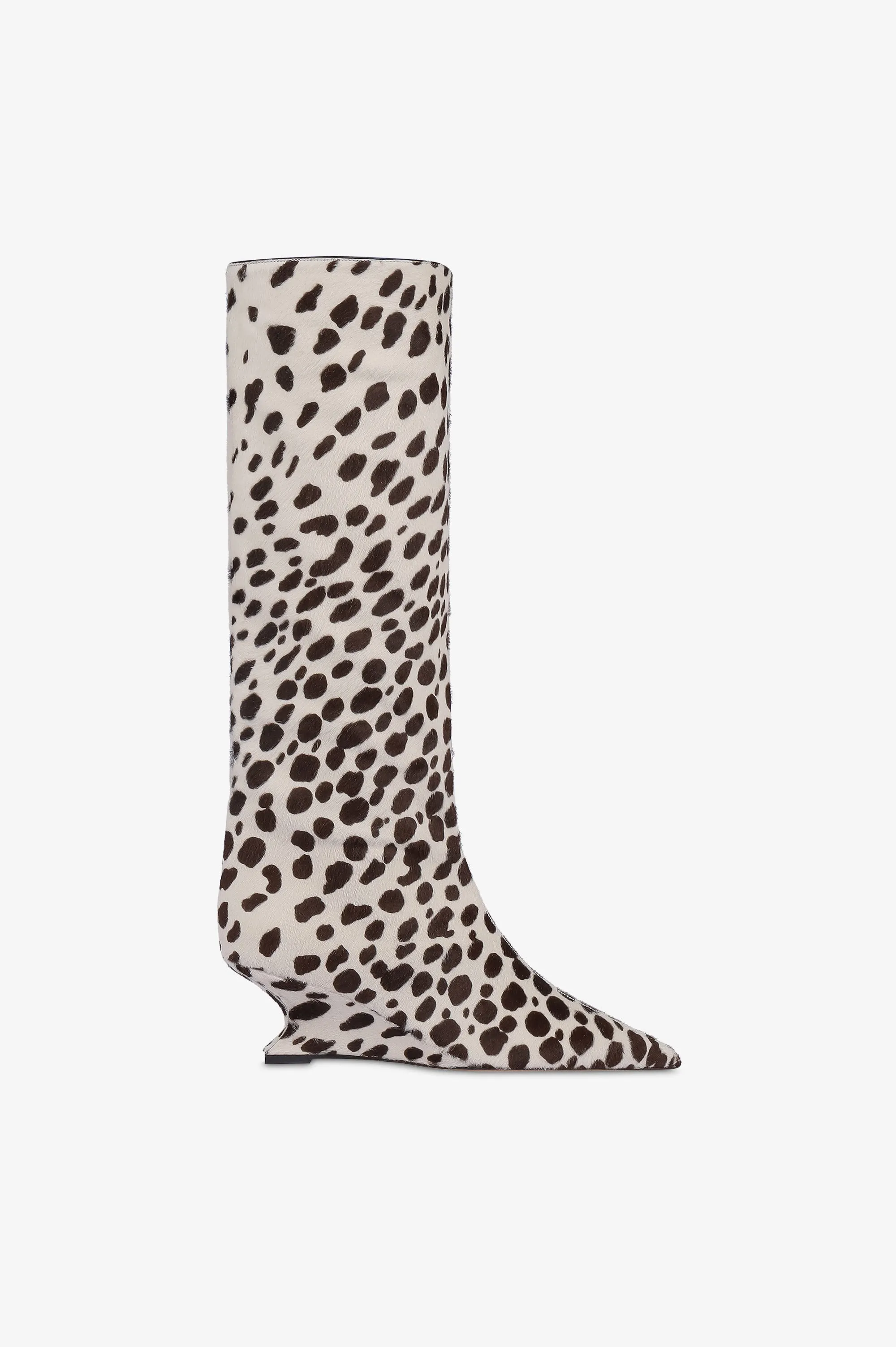Boots in white and dark brown printed cowhide sold by Paris Texas