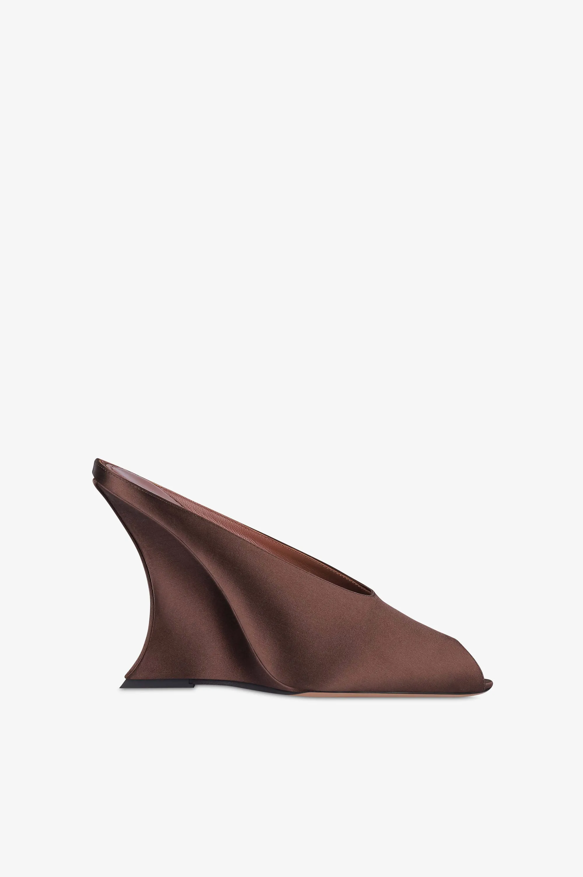 Sabots in ebony satin sold by Paris Texas