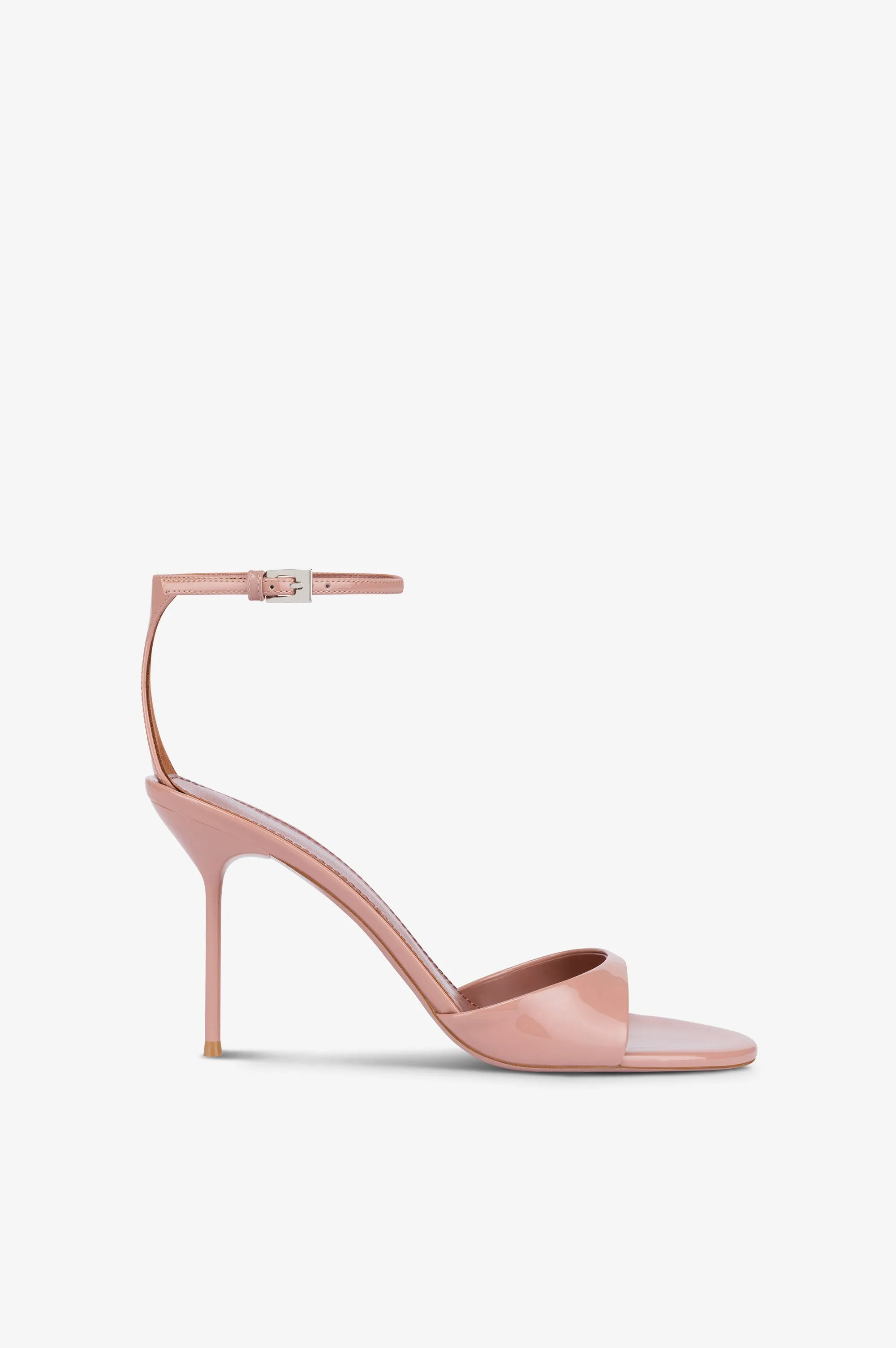 Sandals in dark phard patent leather sold by Paris Texas