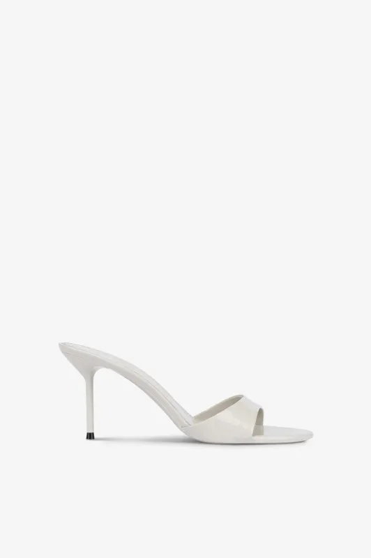 Mules in grey patent leather sold by Paris Texas