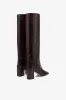 Boots in ebony croco-embossed leather sold by Paris Texas