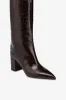Boots in ebony croco-embossed leather sold by Paris Texas