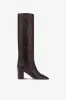 Boots in ebony croco-embossed leather sold by Paris Texas