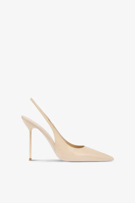 Slingbacks in almond patent leather sold by Paris Texas