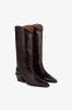Boots in rouge noir croco-embossed leather sold by Paris Texas