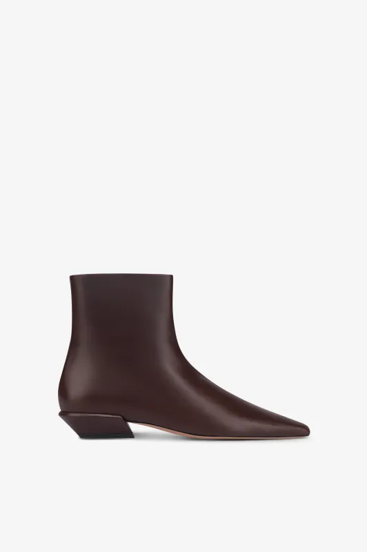 Ankle boots in mocha calf leather sold by Paris Texas