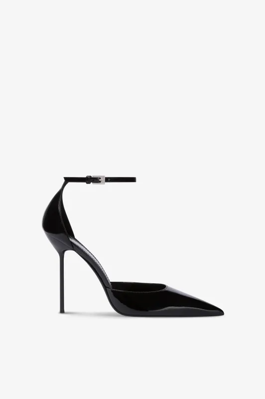 Ankle-strap pumps in black patent leather sold by Paris Texas