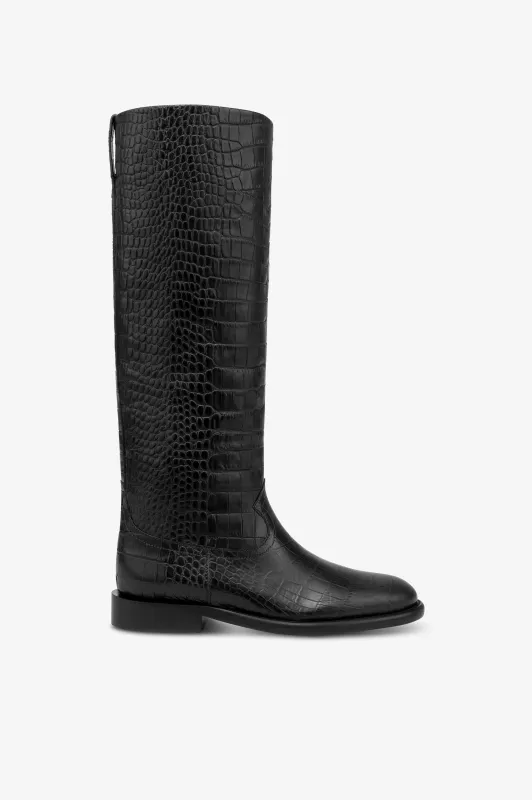 Boots in black croco-embossed leather sold by Paris Texas