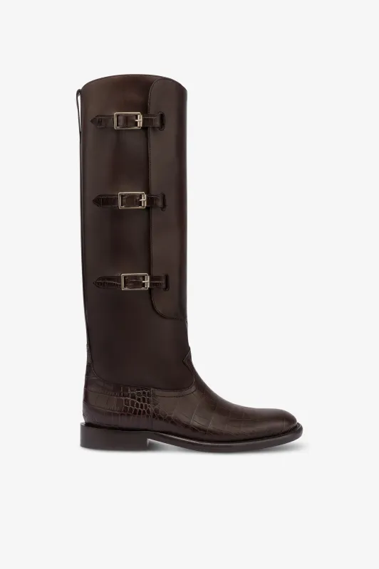 Boots in ebony calf leather with croco-embossed details sold by Paris Texas