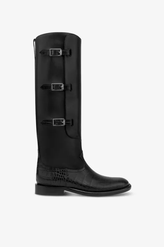 Boots in black calf leather with croco-embossed details sold by Paris Texas