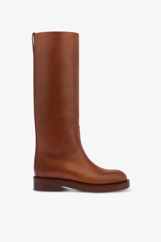 Boots in brown calf leather sold by Paris Texas