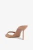 Mules in caramel patent leather sold by Paris Texas