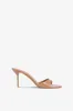 Mules in caramel patent leather sold by Paris Texas