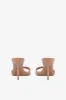 Mules in caramel patent leather sold by Paris Texas