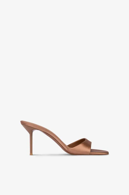 Mules in caramel satin. sold by Paris Texas