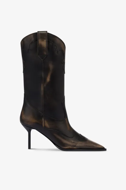 Boots in black brushed leather. sold by Paris Texas