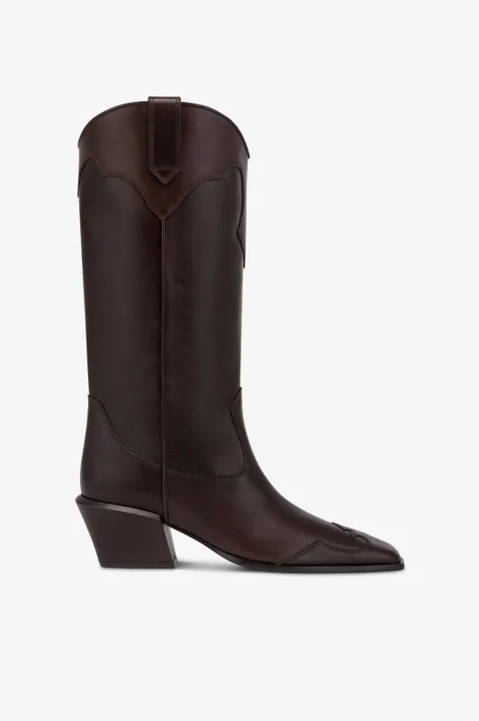 Boots in ebony calf leather. sold by Paris Texas