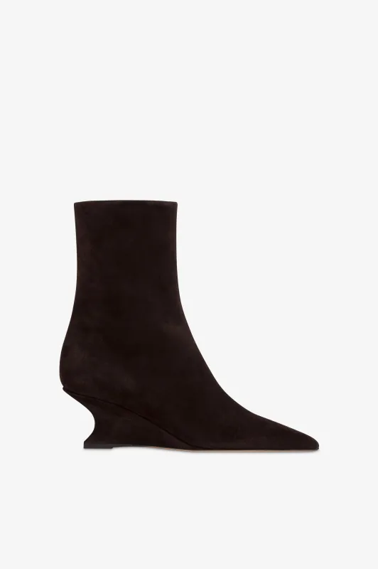 Ankle boots in ebony calf suede leather. sold by Paris Texas