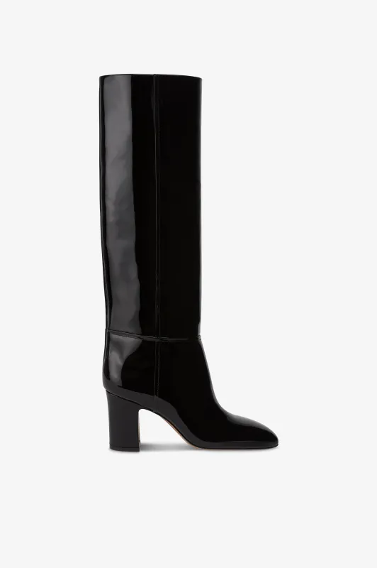 Boots in black patent leather. sold by Paris Texas