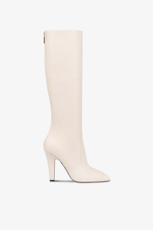 Boots in vanilla calf leather. sold by Paris Texas