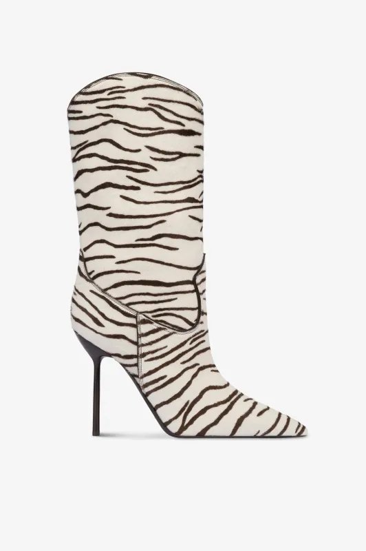 Boots in white and ebony printed cowhide. sold by Paris Texas