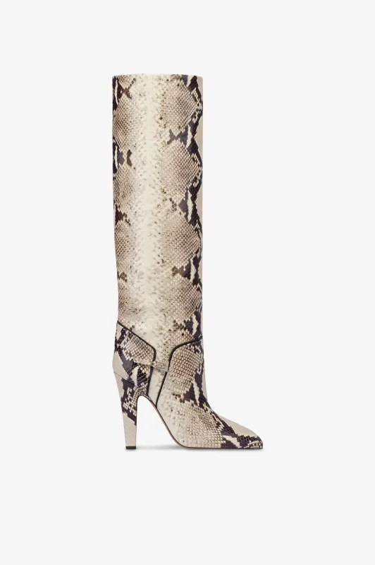 Boots in natural printed python leather. sold by Paris Texas