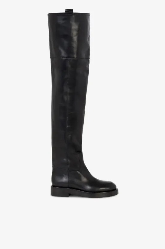 Over-the-knee boots in black calf leather. sold by Paris Texas