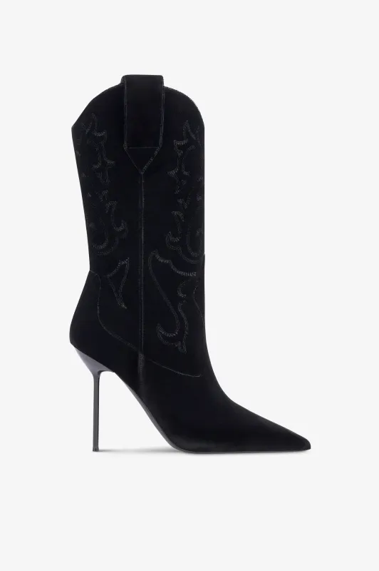 Boots in black velvet. sold by Paris Texas