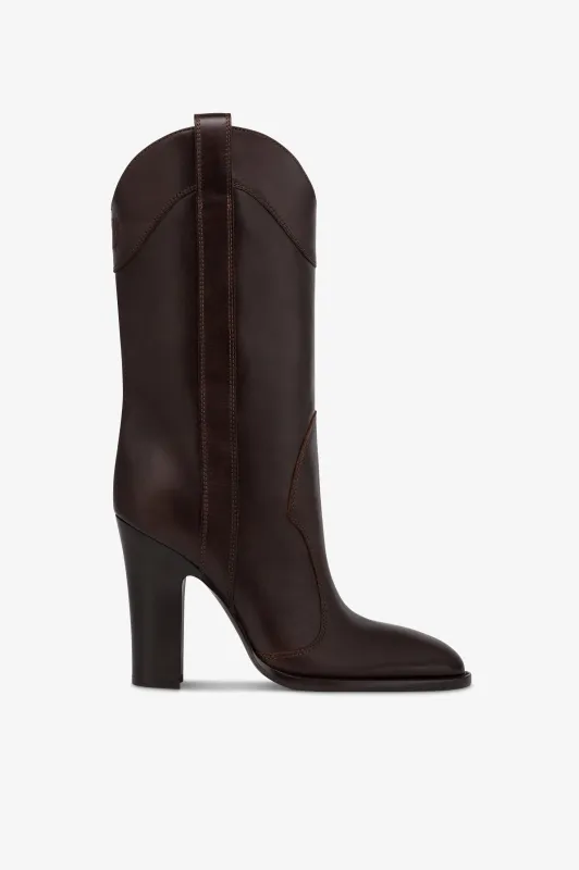 Boots in ebony calf leather. sold by Paris Texas