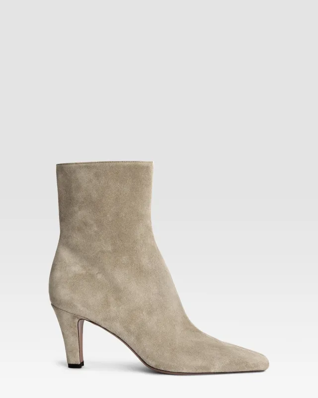 Ankle boots in stone calf suede leather sold by Paris Texas