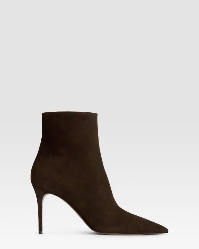 Ankle boots in ebony calf suede leather sold by Paris Texas