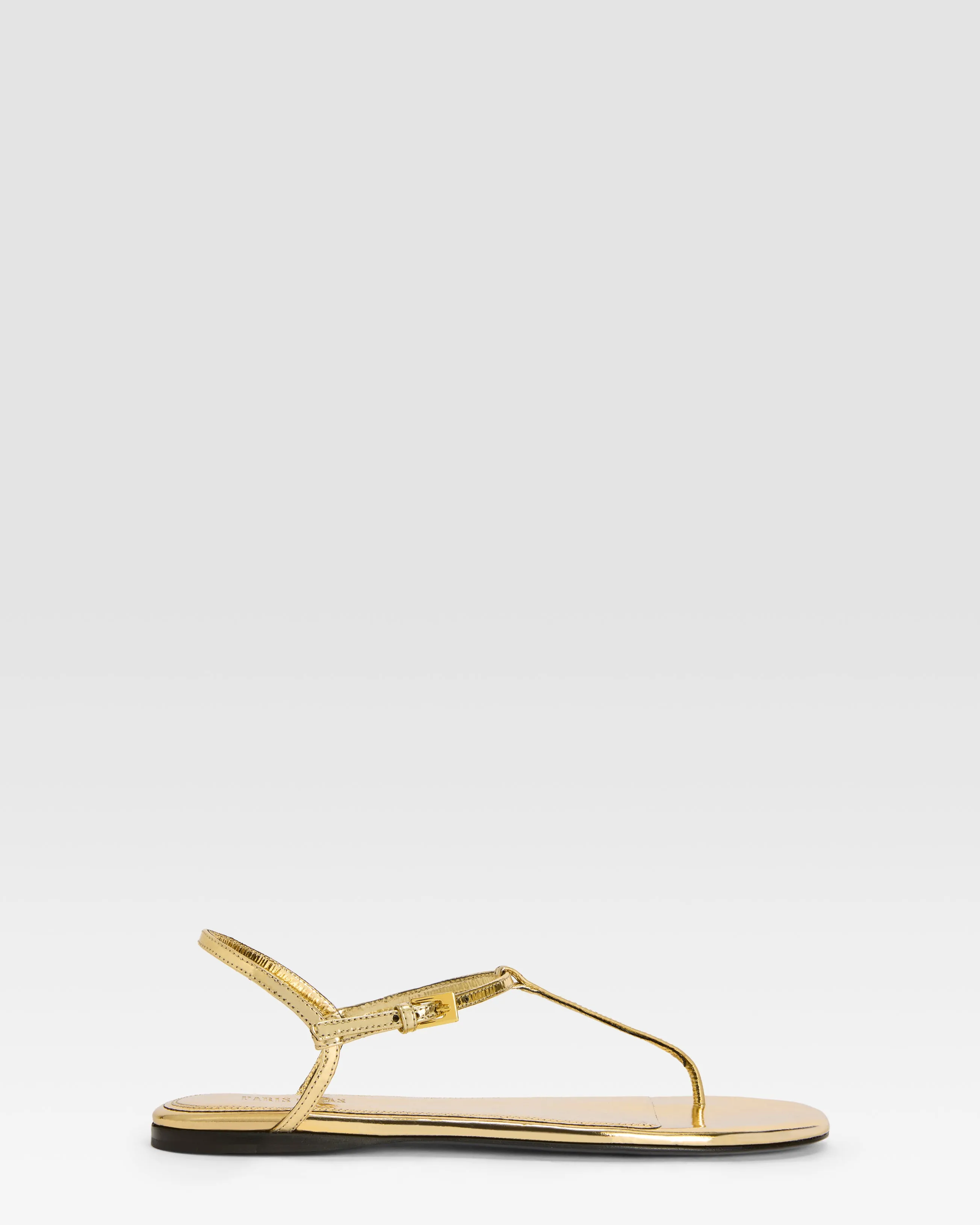 Flat sandals in gold metallic-effect, plisse leather sold by Paris Texas