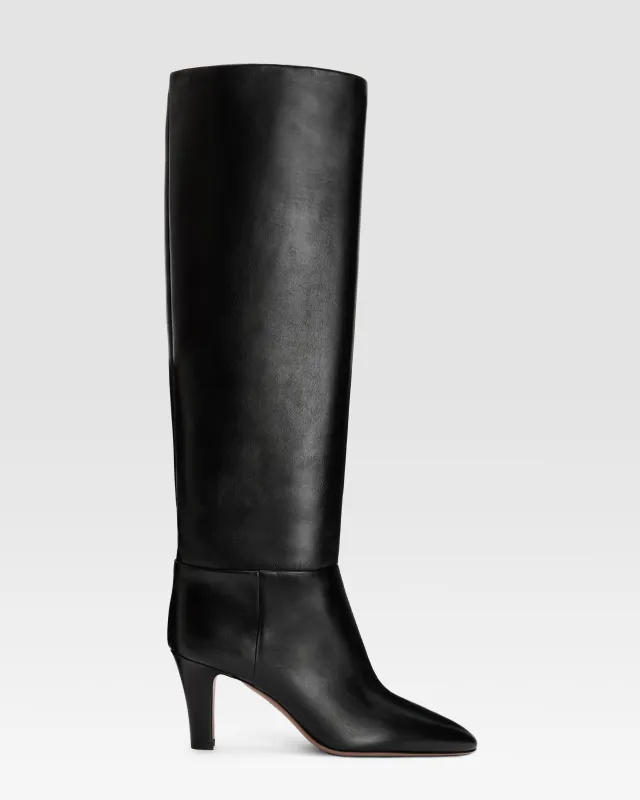 Boots in black leather sold by Paris Texas