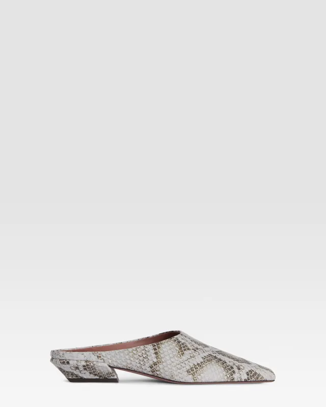 Sabots in denim-colored printed python leather made by Paris Texas