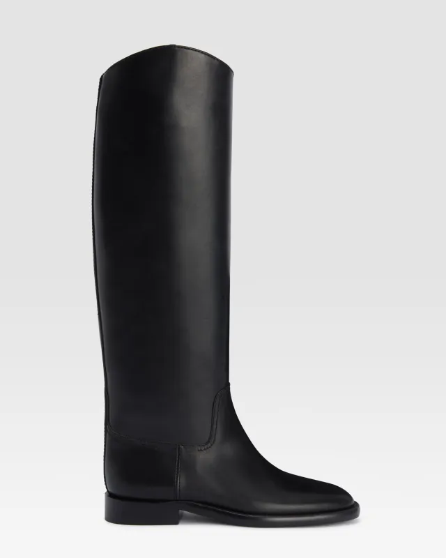Boots in black calf leather sold by Paris Texas