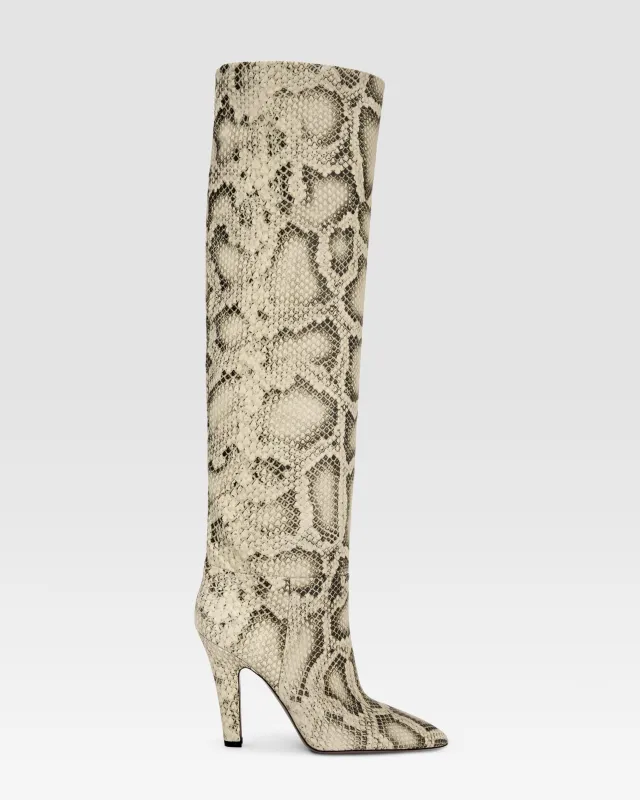 Boots in sand printed python leather sold by Paris Texas