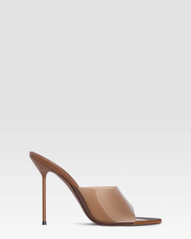 Mules in caramel patent leather sold by Paris Texas