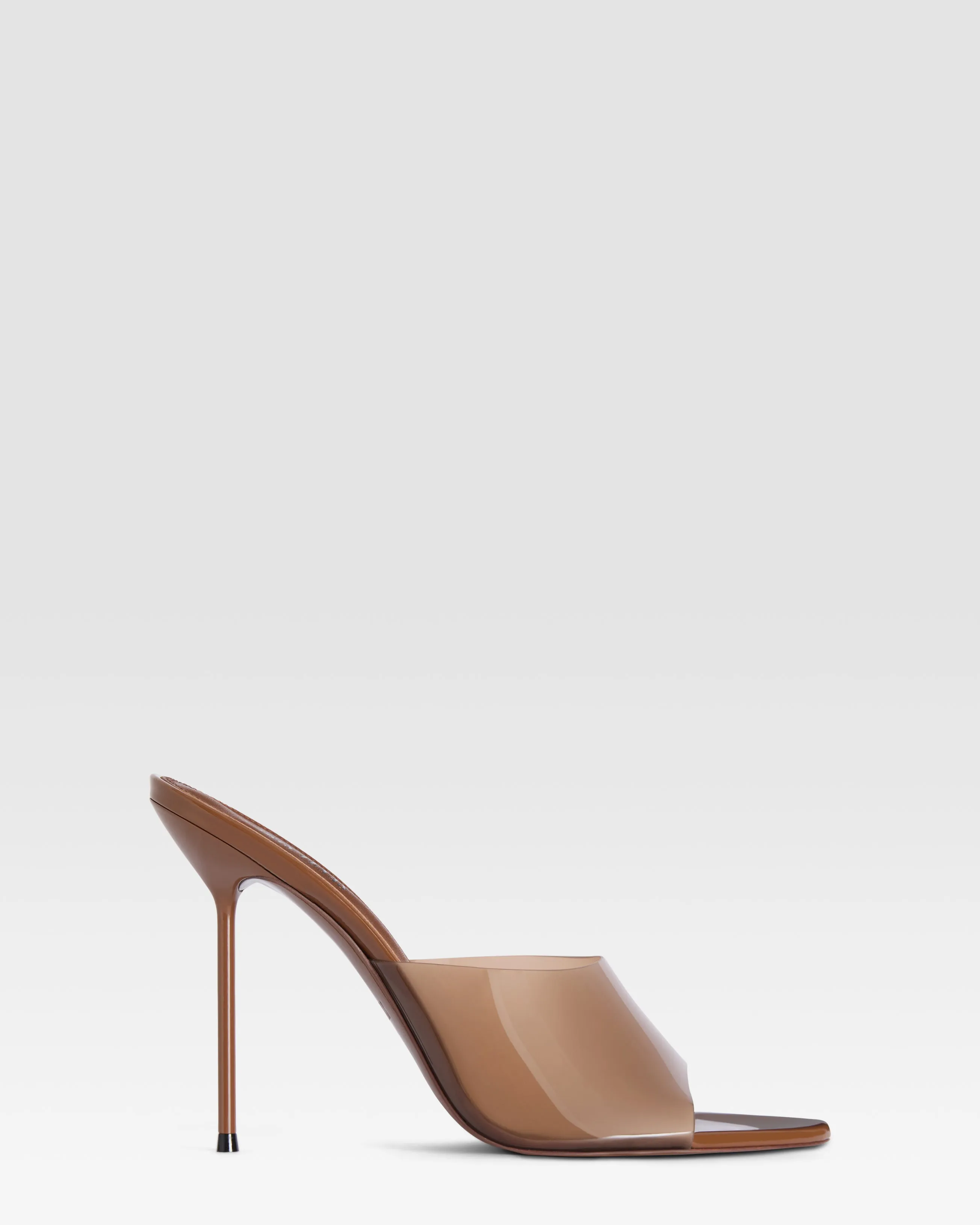 Patent leather and PVC mule sold by Paris Texas