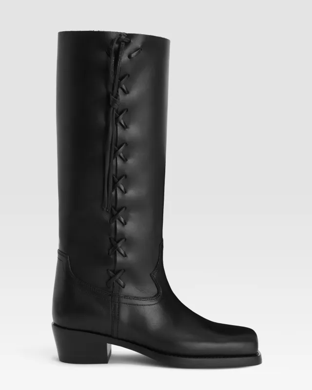 Boots in black calf leather sold by Paris Texas